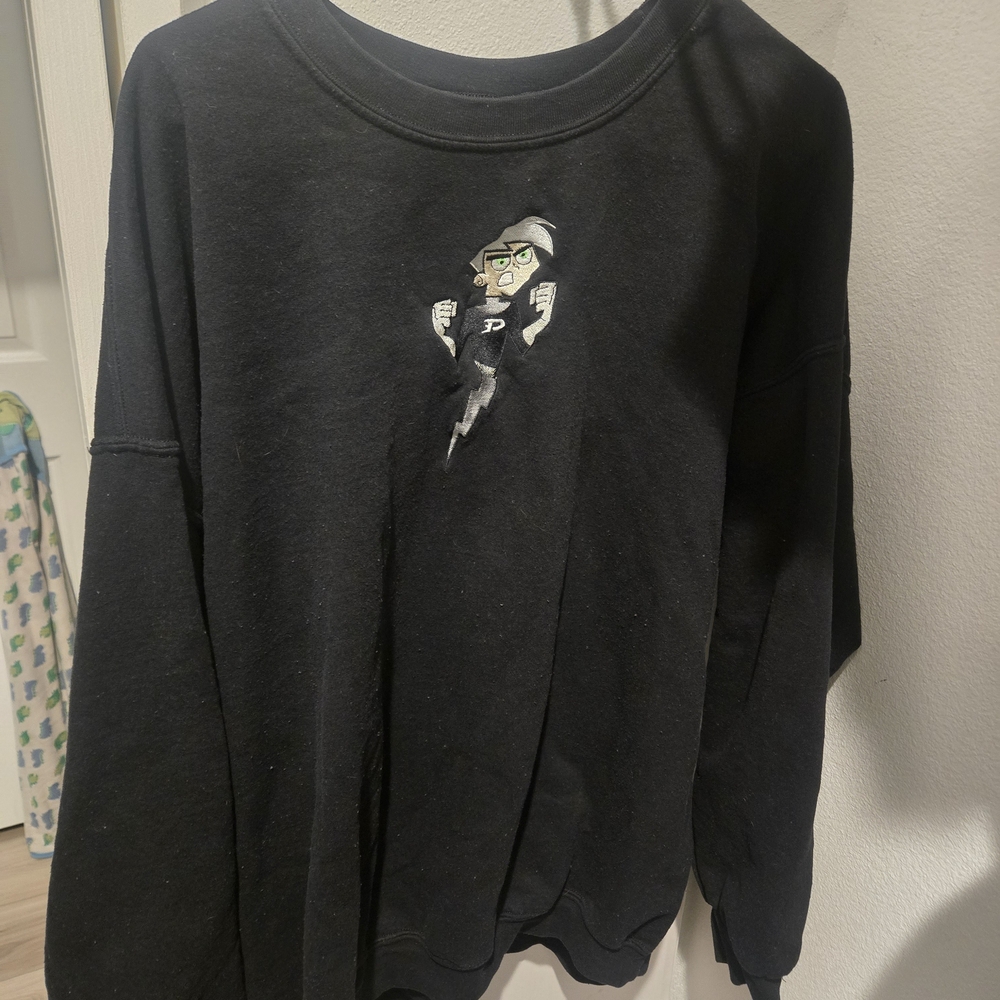 Black Sweatshirt with Cartoon Graphic